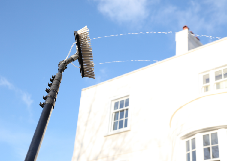 This close-up shot highlights the precision and expertise involved in AE Exterior Cleaning Ltd.'s window cleaning services in Forest Gate.